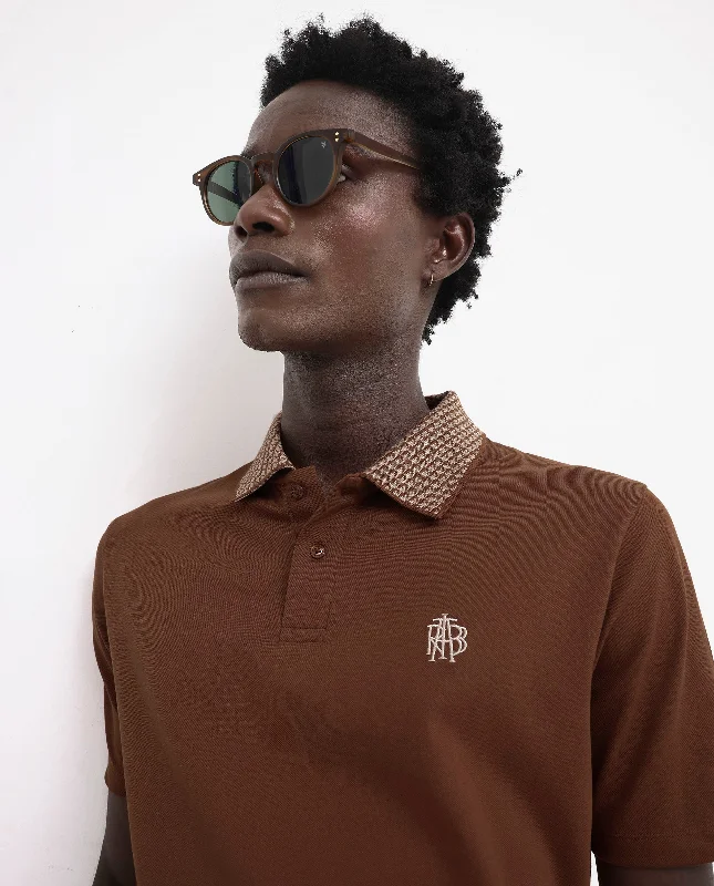 Big discounts – Shop now for amazing deals. Rare Rabbit Men's Booth Rust Short Sleeve Textured Collar Embroidered Logo Plain Polo T-Shirt Big discounts – Shop now for amazing deals. Rare Rabbit Men's Booth Rust Short Sleeve Textured Collar Embroidered Logo Plain Polo T-Shirt