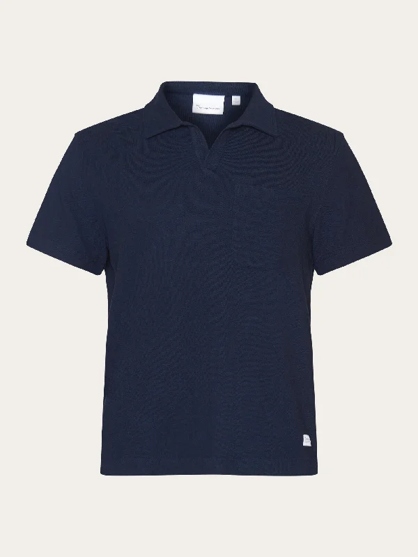 Shop the best fashion at unbeatable prices – Limited time only. Loose cotton bouclé jersey short sleeved polo - GOTS/Vegan - Night Sky Shop the best fashion at unbeatable prices – Limited time only. Loose cotton bouclé jersey short sleeved polo - GOTS/Vegan - Night Sky