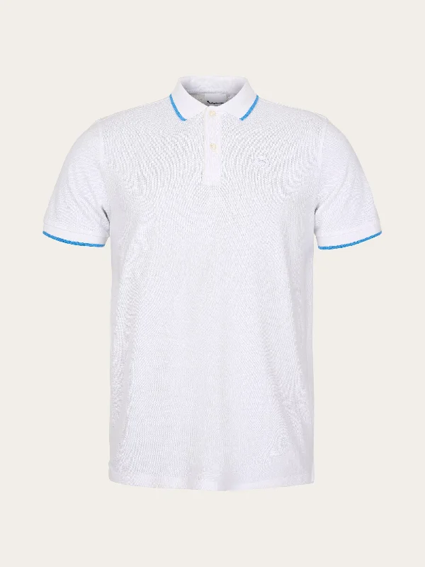 Look sharp without breaking the bank – men’s clothing sale now! Polo with badge and contract stripe at rib - Bright White Look sharp without breaking the bank – men’s clothing sale now! Polo with badge and contract stripe at rib - Bright White